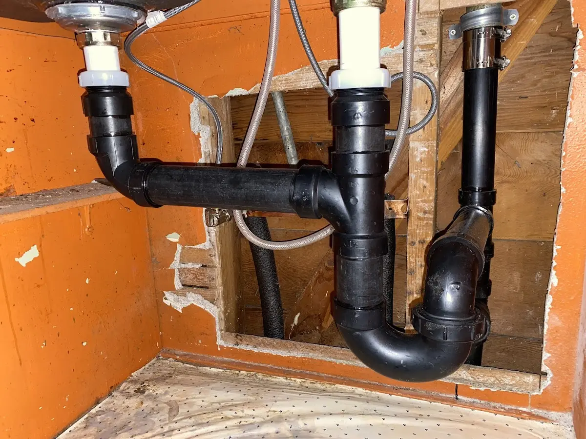 Professional Garbage Disposal Repair equipment and tools on the job in Rockville Centre